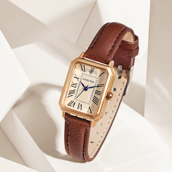 Elegant women's rectangle quartz watch with classic leather strap, perfect for daily wear.