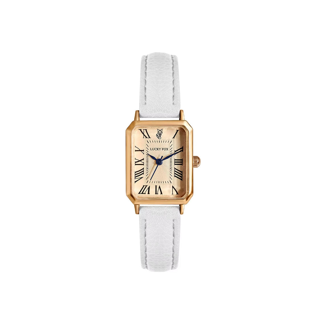 Modern classic women's rectangle watch, quartz movement, elegant white dial, and a black leather strap.