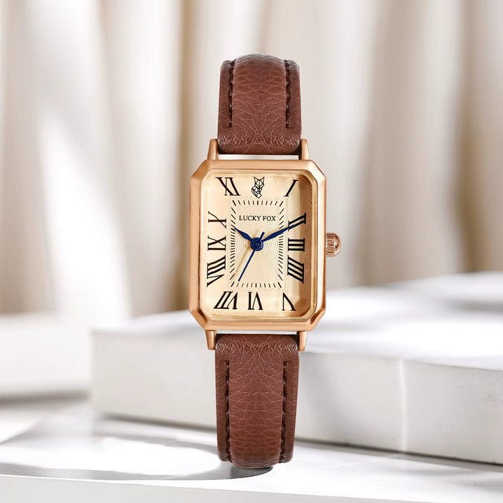 Chic women's rectangle quartz watch, sleek design with a genuine leather strap for modern style.