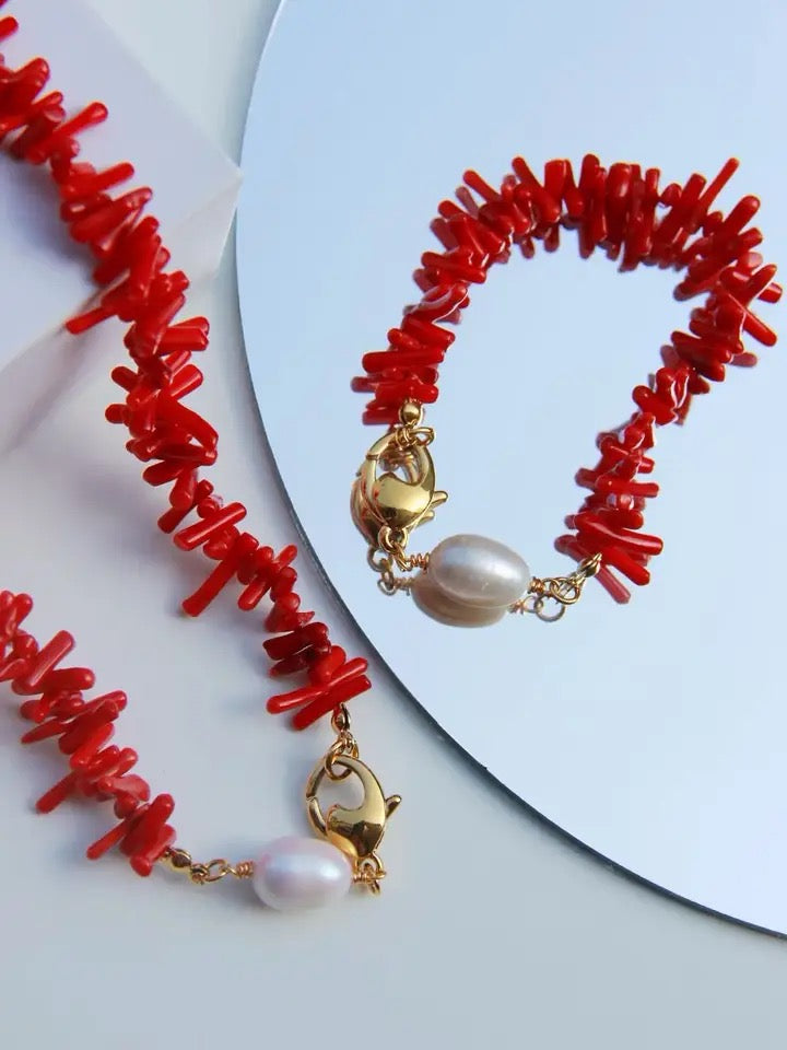 Vibrant red coral beaded bracelet for women, an elegant gemstone jewelry piece with a timeless design.