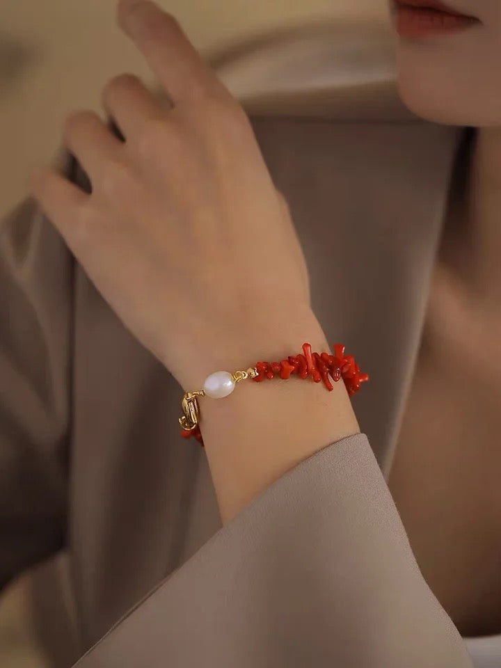 Stylish red coral gemstone bracelet for women, an elegant beaded jewelry piece and timeless fashion accessory.