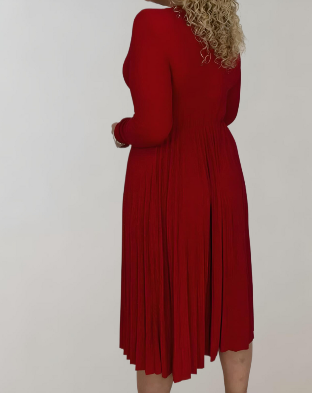 Flattering women's red high-waist midi dress. Elegant V-neck, long sleeves & pleated design for formal parties.