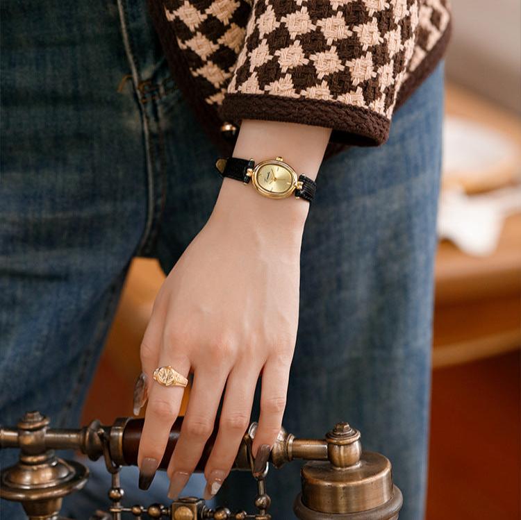 Sophisticated black rectangle women's watch, an elegant timepiece with a refined design for any occasion.