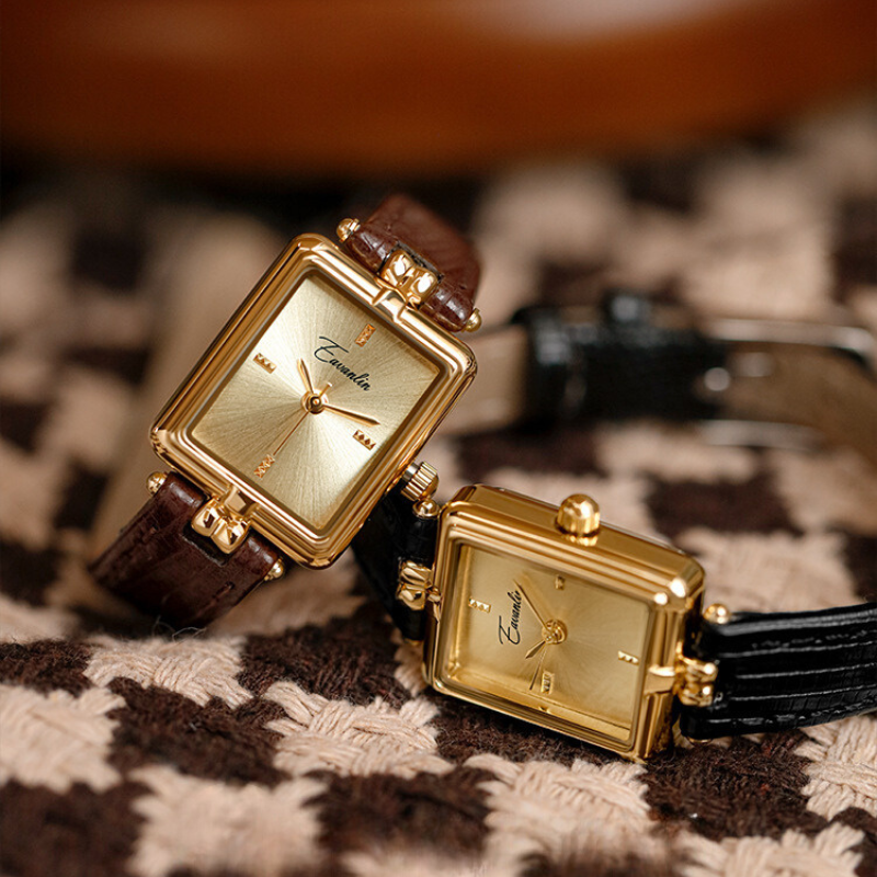 Classic brown oval women's dress watch, a stylish and refined fashion accessory with a beautiful strap.