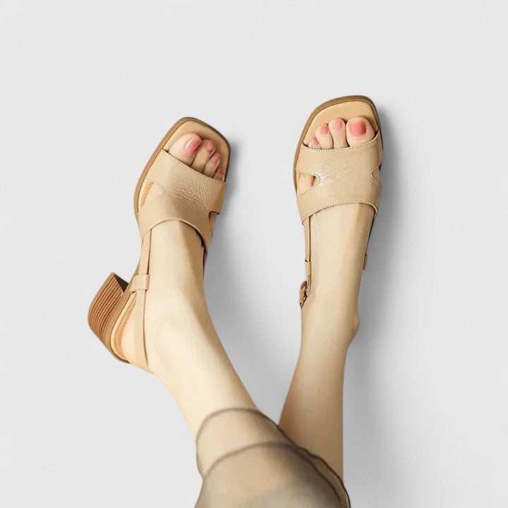 Versatile women's brown block heel sandals with a modern square toe. Comfortable, retro-style summer fashion shoes.