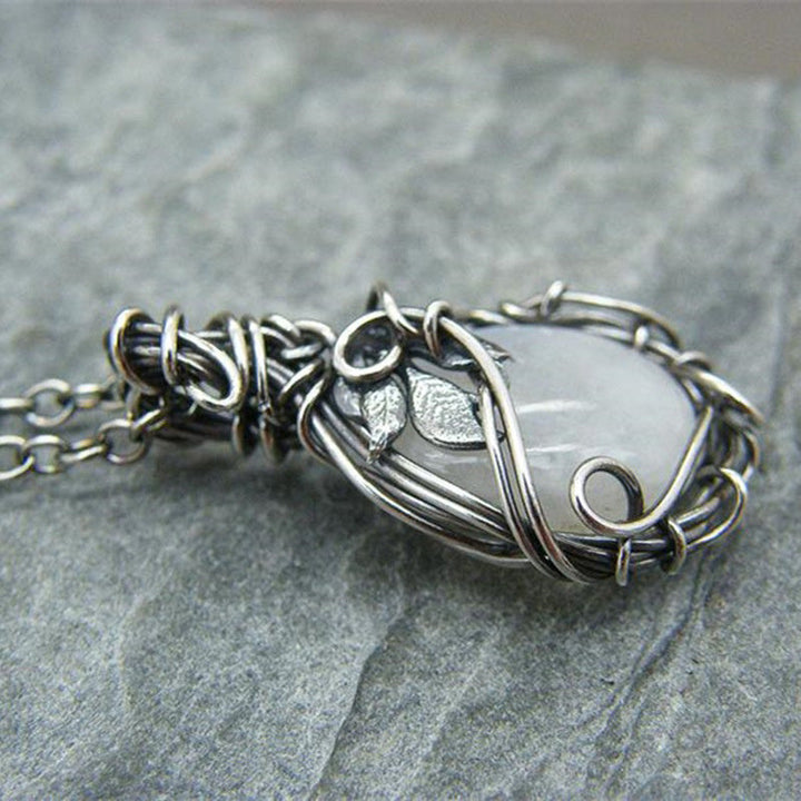 Mystical moonstone gemstone pendant necklace for women, showcasing a beautiful retro vintage design.