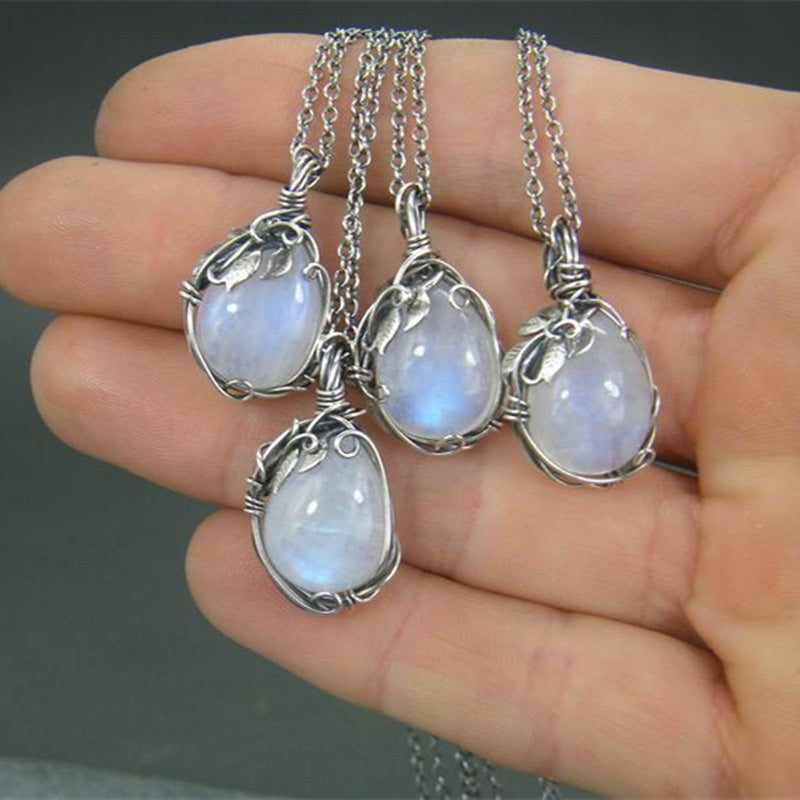 Stunning retro moonstone pendant necklace. An elegant vintage gemstone jewelry piece with mystical charm.