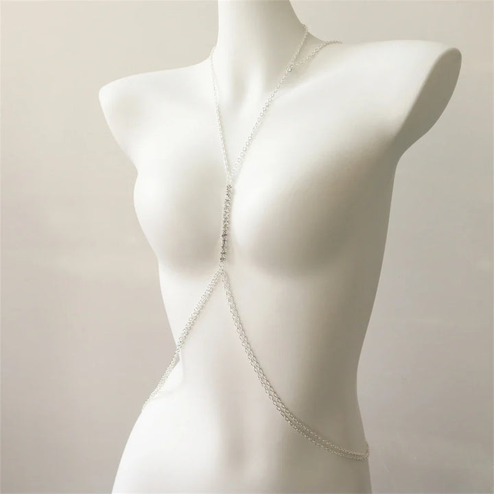 Glamorous women's chest necklace featuring intricate rhinestone body chain design, a sparkling fashion accessory.