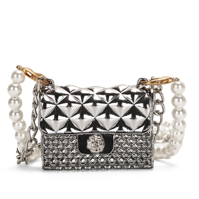 Stylish women's mini evening purse with elegant rhinestones, a perfect clutch for parties.