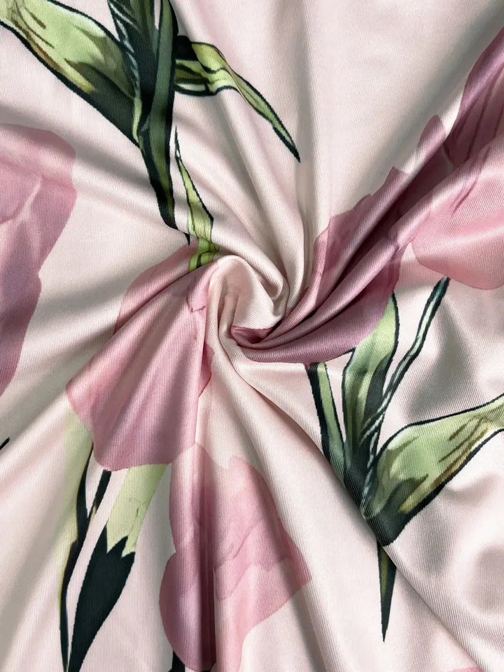 Stylish women's floral maxi dress with jacket. A chic pink dress set, perfect for elegant spring fashion.