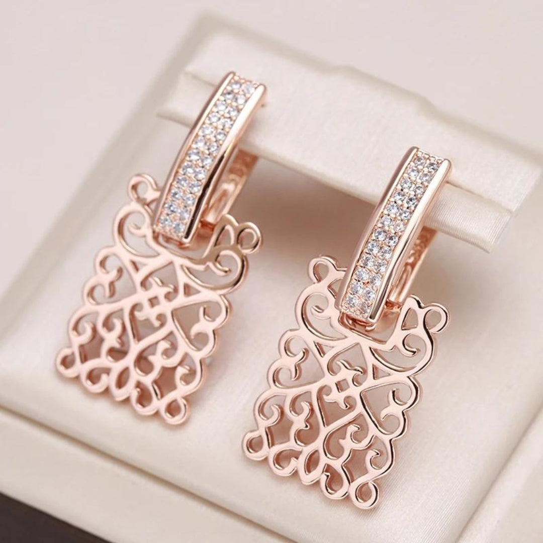 Elegant women's rose gold ivy zirconia drop earrings, a nature-inspired gift for special occasions.