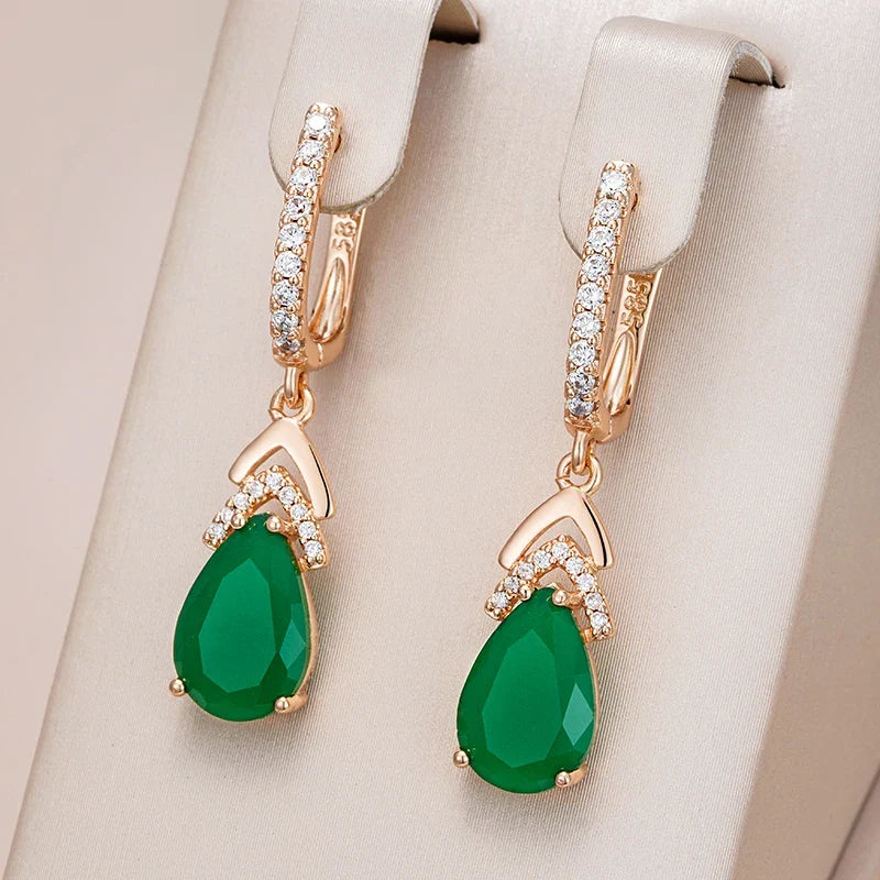 Sparkling rose gold teardrop gemstone earrings for women, elegant dangle style, a beautiful gift.