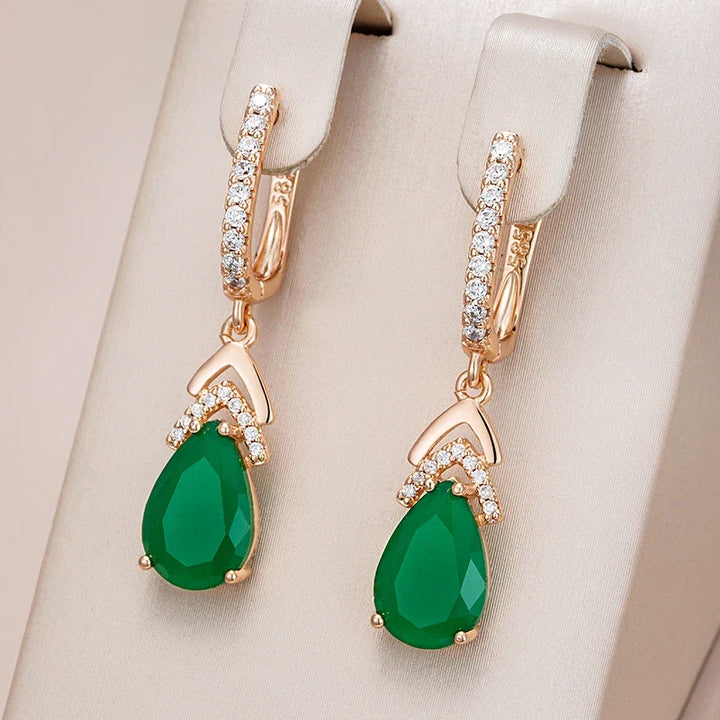 Sparkling rose gold teardrop gemstone earrings for women, elegant dangle style, a beautiful gift.