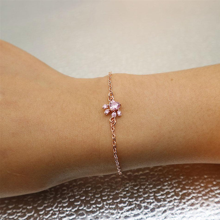 Lovely rose quartz cat paw bracelet, an adjustable rose gold-tone gift for her. Perfect elegant jewelry for cat lovers.
