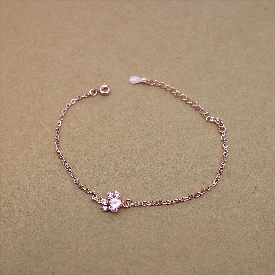 Pink rose quartz gemstone bracelet with a cute cat paw design. Adjustable women's jewelry, ideal gift for cat lovers.