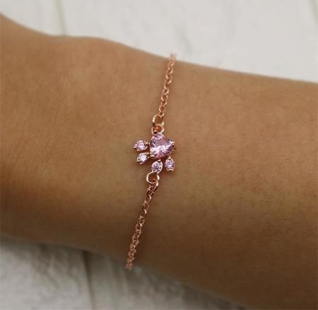 Women's elegant rose quartz cat paw bracelet. Adjustable rose gold-tone jewelry, ideal gift for cat lovers and her.