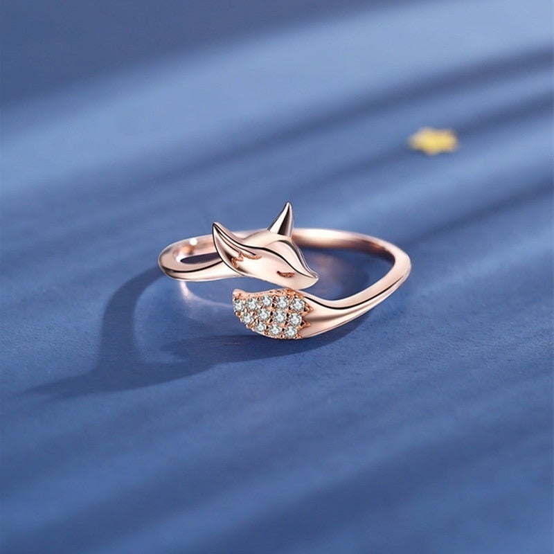 Elegant women's rose silver fox ring, adjustable & stylish. Perfect animal jewelry for her.