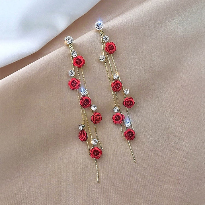 Beautiful Rosella women's waterfall rose drop earrings. Romantic red & purple flower jewelry, an elegant gift for her.