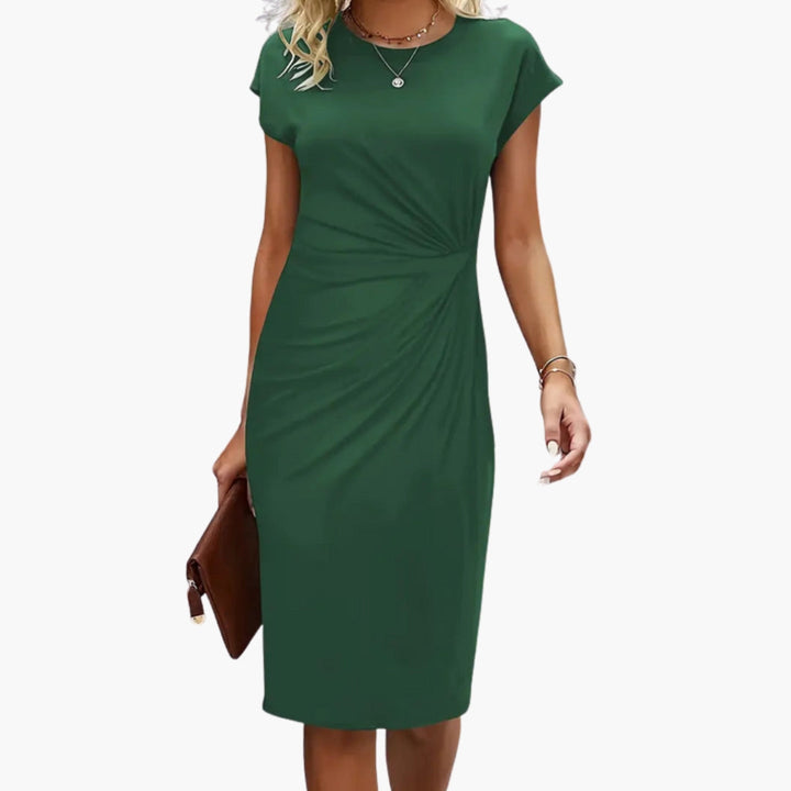 Fashionable women's elegant midi dress with a round neck and short sleeves, suitable for many occasions.