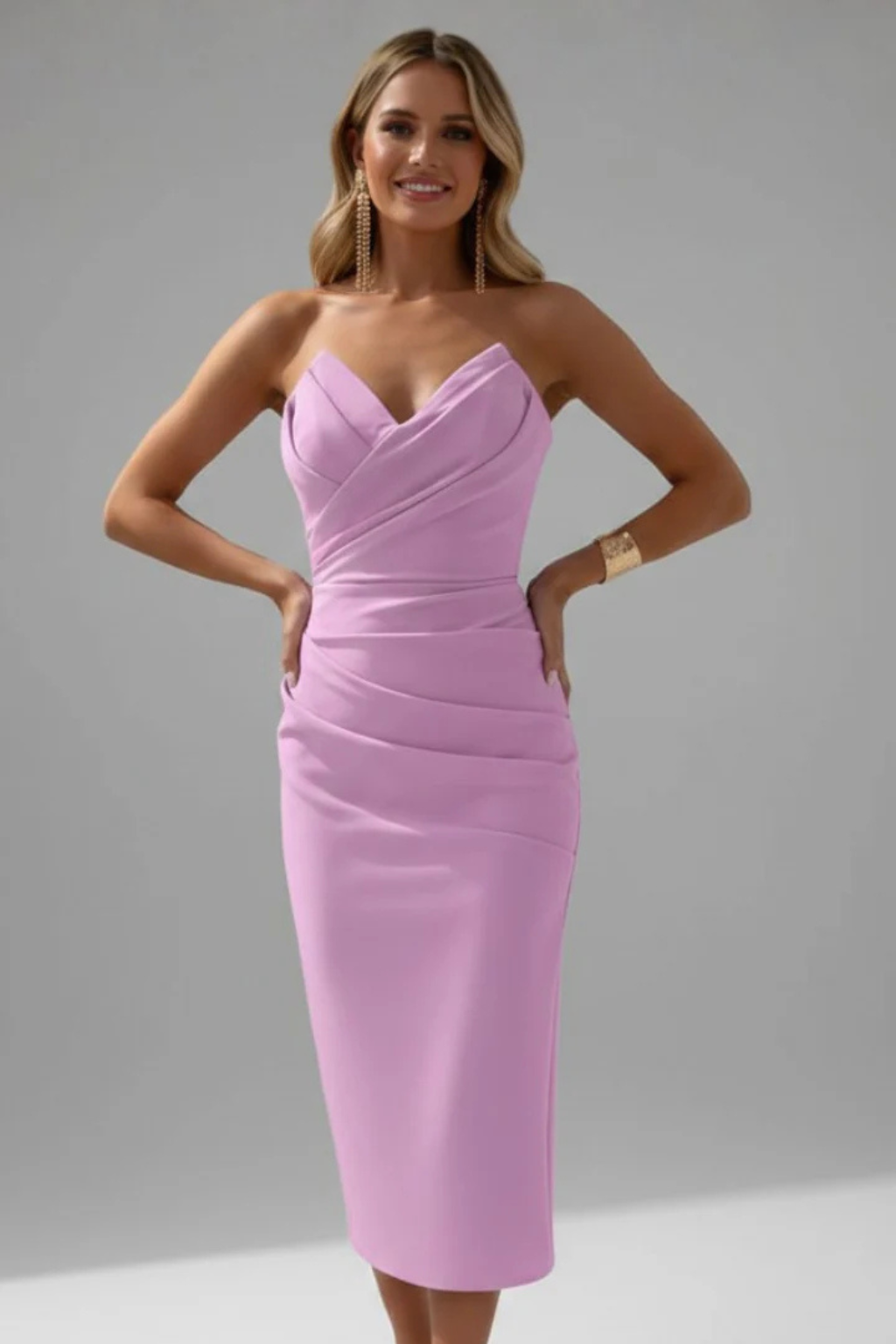 Full length view of a women's ruched sweetheart midi dress, elegant & perfect for special occasions.