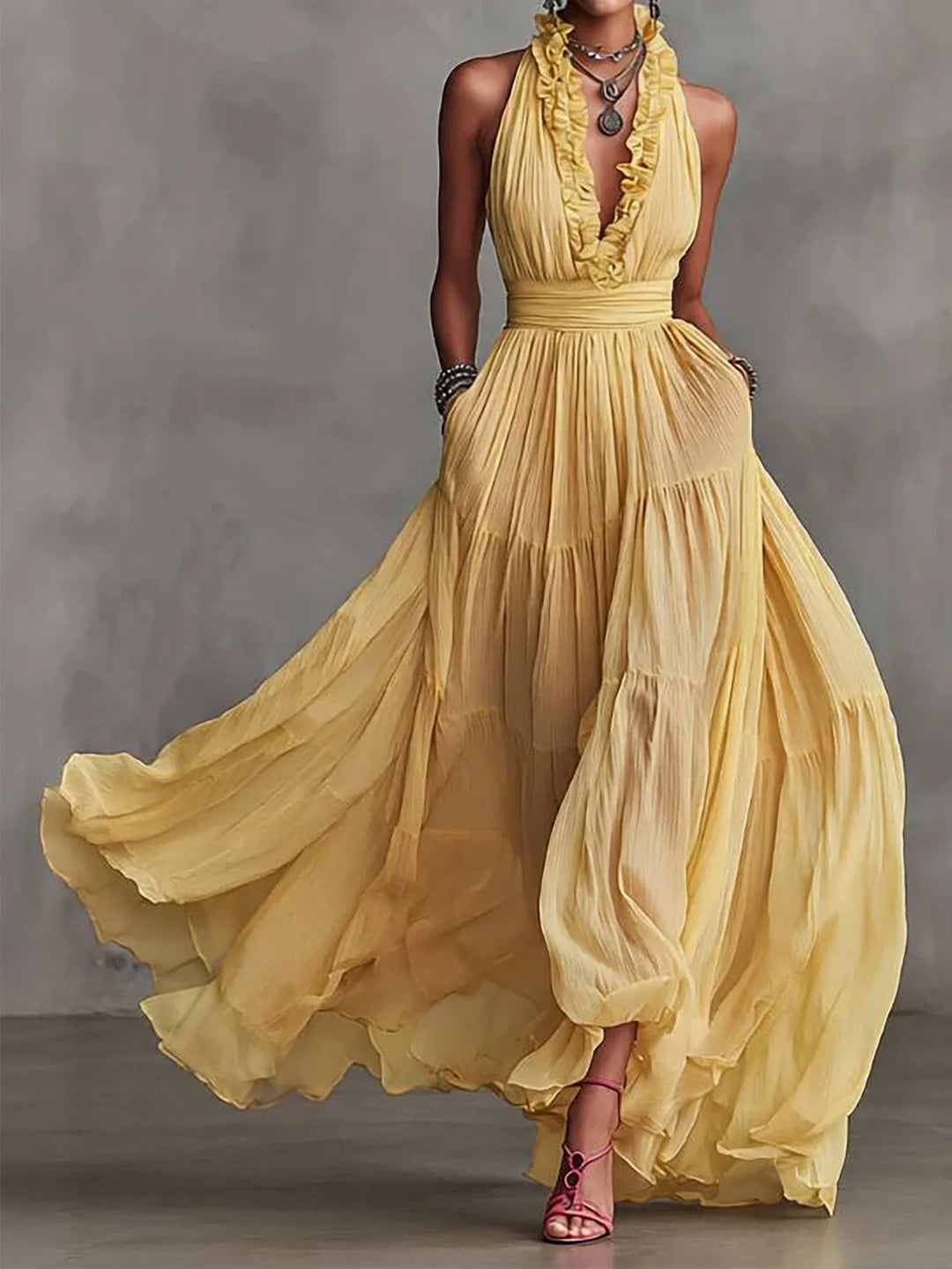 Elegant women's ruffle trim backless evening maxi dress with pleated skirt, perfect for formal occasions.