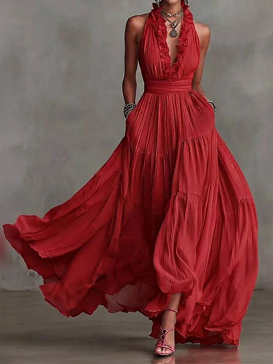 Long elegant women's maxi dress with ruffle trim, ideal for wedding guests & special occasion party wear.