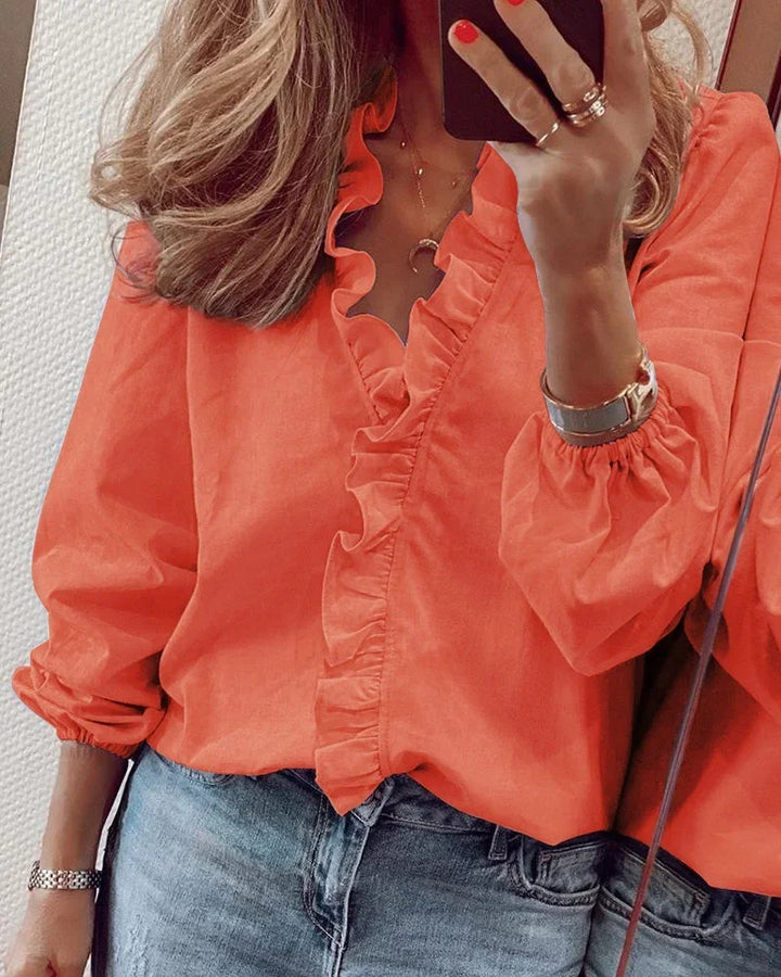 Elegant women's ruffle V-neck long sleeve blouse, versatile for casual or office wear.
