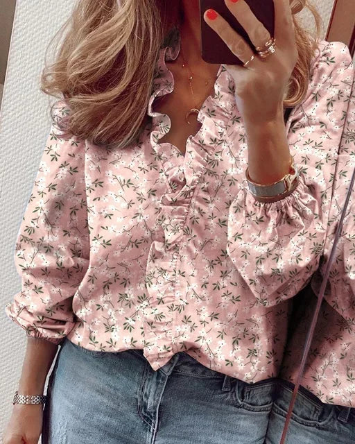 Relaxed fit women's ruffle V-neck long sleeve blouse, offering comfort & style for everyday fashion.