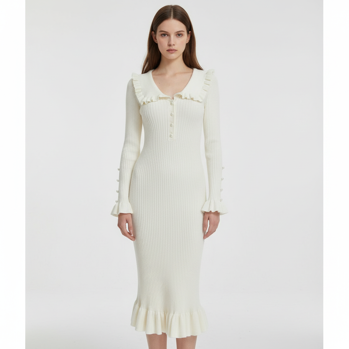 Close-up of a high-waist knit maxi dress featuring delicate ruffles, a versatile addition to elegant women's fashion.
