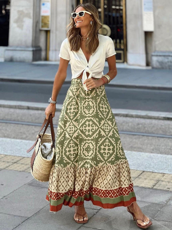 Elegant ruffled long skirt in a flowy maxi style, perfect for versatile women's summer and evening fashion.