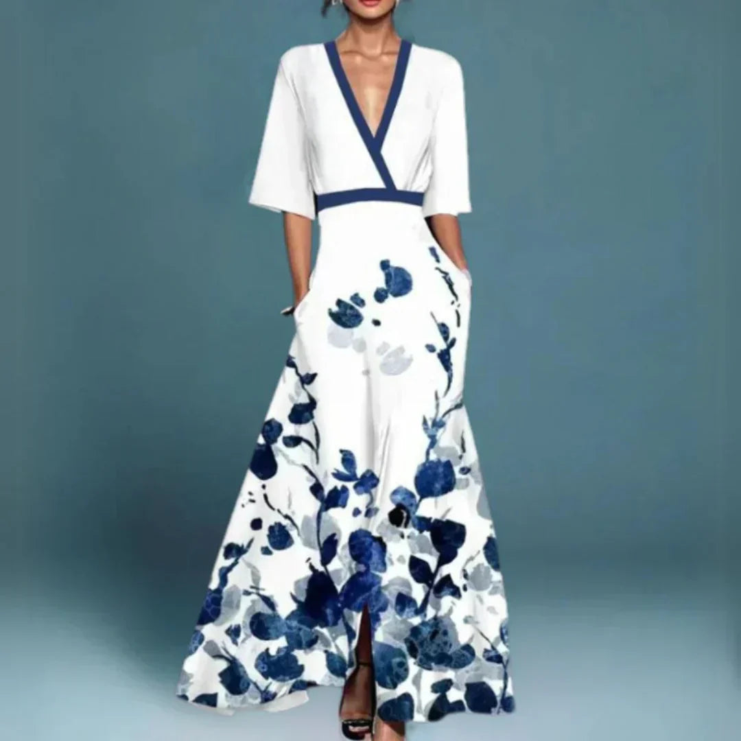 Flowy white floral V-neck maxi dress for women, perfect for summer parties & elegant occasions.
