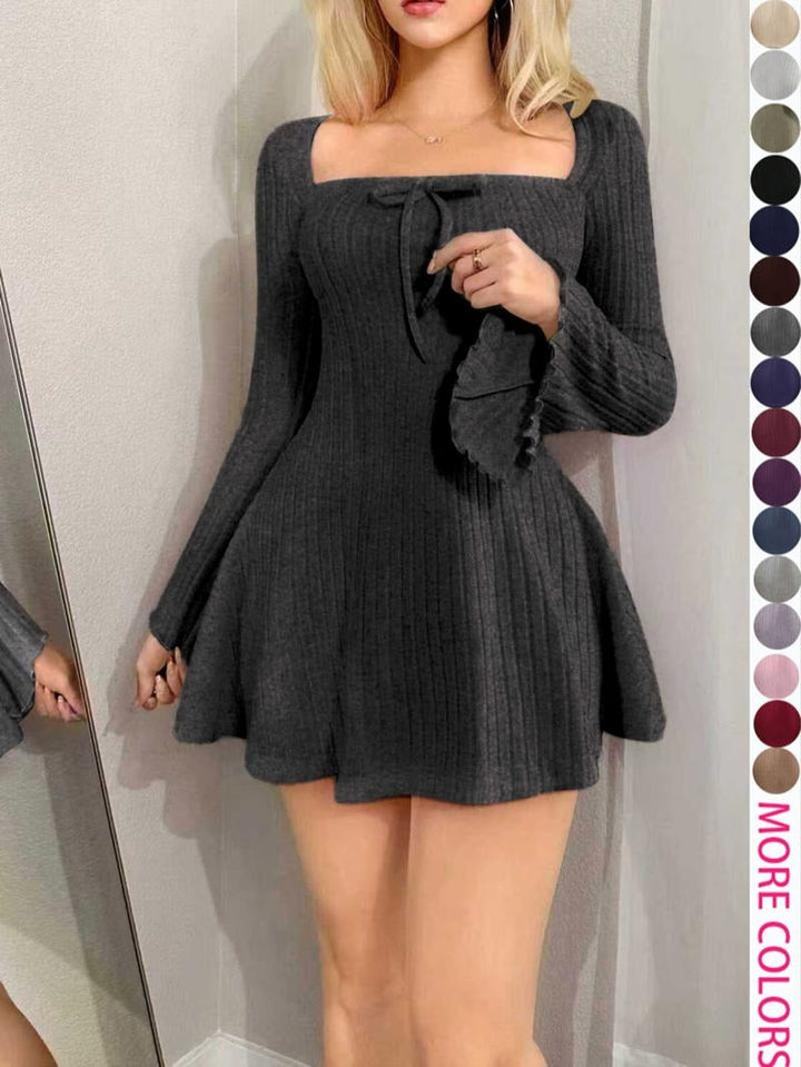 Stylish women's long sleeve tie-front maxi dress. Features an elegant square neckline and a flattering sculpted design.