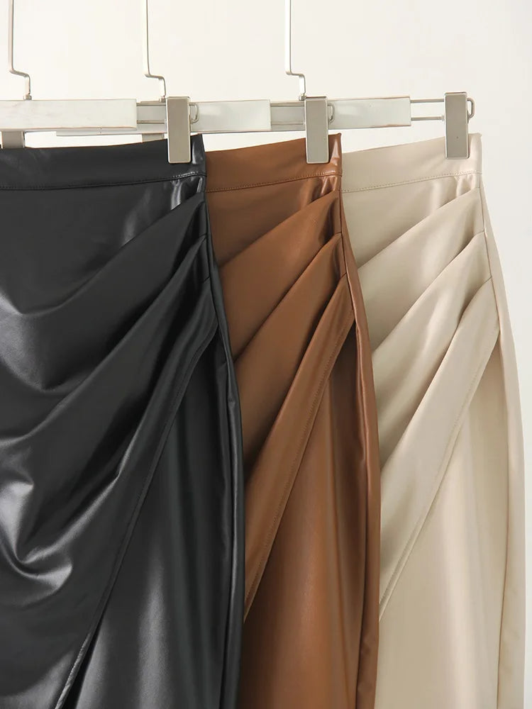 Modern chic women's sculpted wrap skirt with elegant front slit. Versatile midi length for contemporary fashion statements.