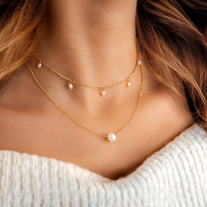 Adjustable women's sea pearl necklace, minimalist gold & silver jewelry. Elegant design for daily wear or special gifts.