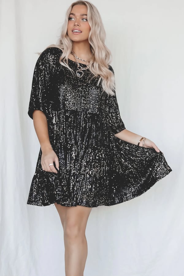Elegant women's Shimmerflow sequin A-line midi dress, perfect for party and evening wear, sparkling glitter fashion.