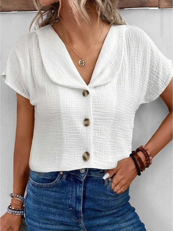 Stylish Sophia women's short sleeve blouse, a comfortable and versatile top for layering or casual chic outfits.