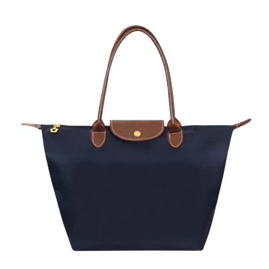 Spacious women's shoulder bag, elegant & organized. Nylon everyday handbag with multiple compartments.