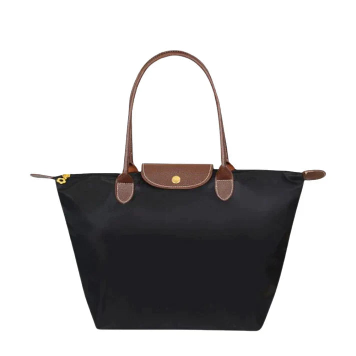 Elegant women's shoulder handbag for everyday luxury. Spacious & versatile fashion accessory, designer quality.