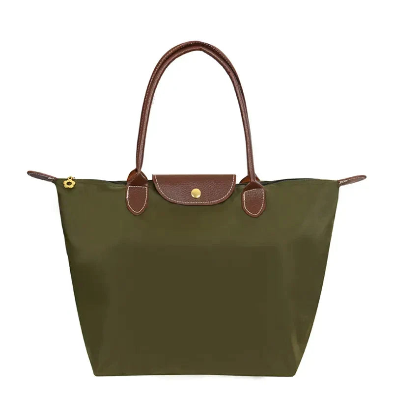 Spacious & organized women's luxury shoulder handbag, an elegant everyday fashion accessory. Designer quality.