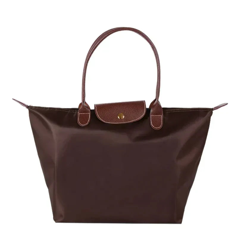 Designer quality women's elegant shoulder handbag. A luxury purse & stylish everyday fashion accessory.