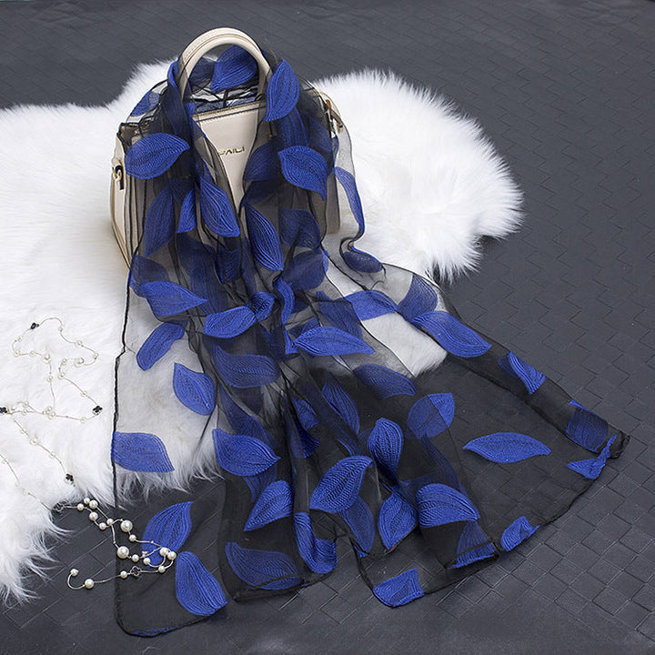 Stylish floral cut-out silk scarf for women, perfect for adding elegance.