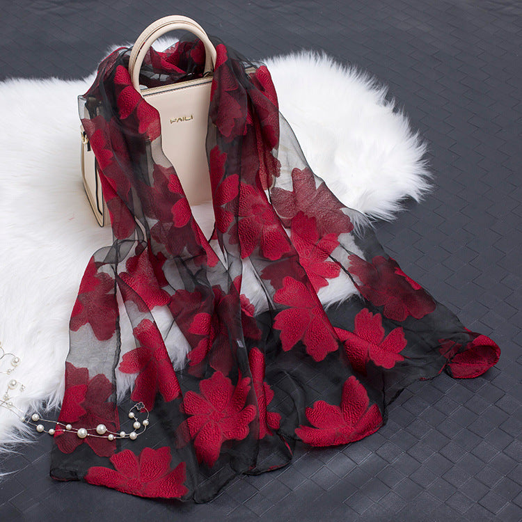 Fashion-forward floral cut-out silk scarf, an ideal gift for her.