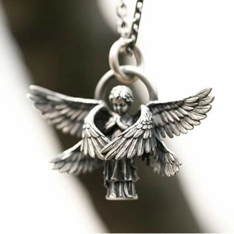 Elegant women's silver angel wing pendant necklace, a delicate celestial jewelry piece.
