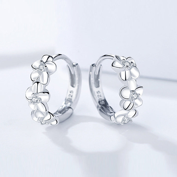 Sterling silver floral earrings for women. Elegant and delicate silver jewelry with timeless charm, great gift.