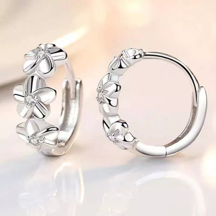 Timeless women's silver floral earrings. Elegant sterling silver jewelry with delicate design, push-back.