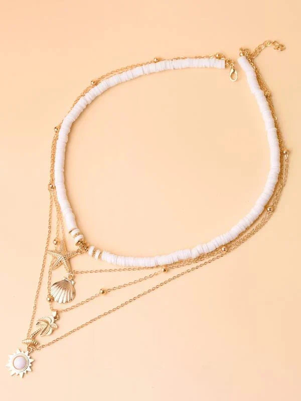 Fashionable women's starfish layered silver necklace, a delicate ocean jewelry gift. Adjustable fit.