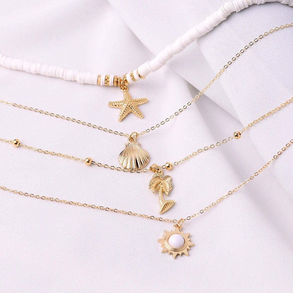 Exquisite women's silver starfish layered necklace, adjustable delicate ocean jewelry for a stylish look.