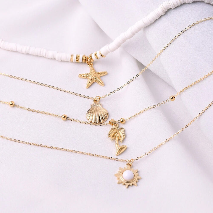Exquisite women's silver starfish layered necklace, adjustable delicate ocean jewelry for a stylish look.