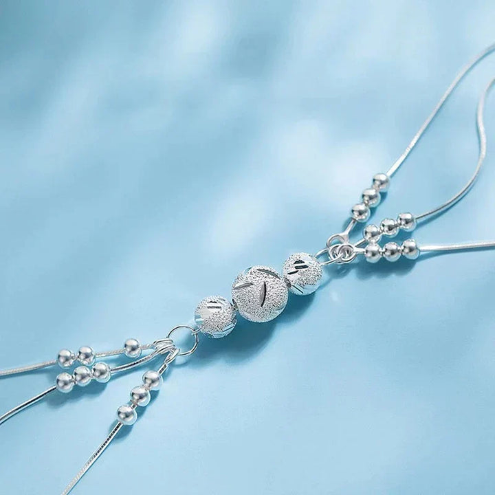 Beautiful women's silver pearl bracelet. This adjustable sterling silver jewelry with natural pearls is truly elegant.