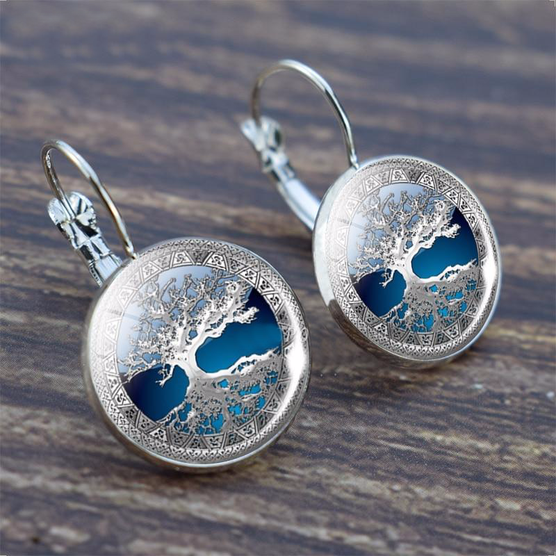 Elegant women's silver Tree of Life drop earrings, perfect for spiritual gifting or everyday wear.